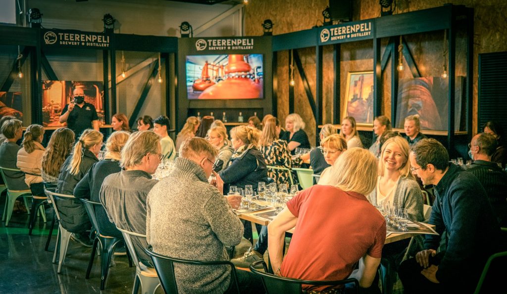 Happy people having a happy tasting.